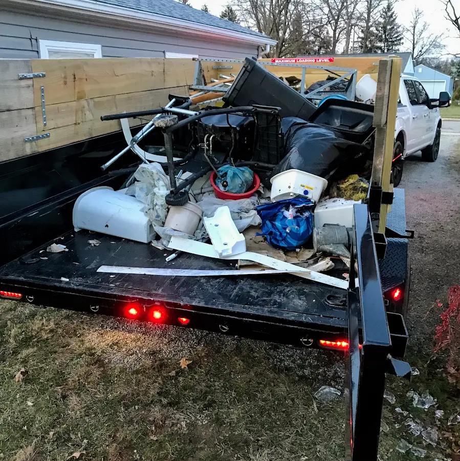 Roll-off dumpster delivered to a residential driveway in Latimer